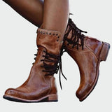 Botins de couro com atacadores