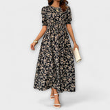 Amelia - Vestido com decote redondo e padrão floral
