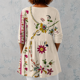 Clara | Blusa longa de linho com padrão floral folclórico e bainha decorada