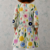 Louise | Blusa longa em linho com padrão de flores pintadas à mão em caules