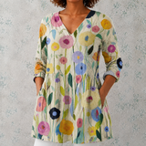 Louise | Blusa longa em linho com padrão de flores pintadas à mão em caules