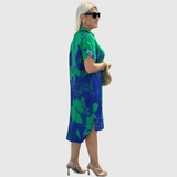 Christiane | Vestido camisa com estampa floral e botão frontal