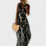 Vestido fluido com decote em V e detalhes em lantejoulas