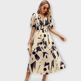 Vestido Maxi Abstrato com Mangas Bufantes
