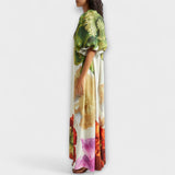 Skylar - Vestido Maxi com Estampado Floral, Decote Assimétrico e Mangas Bufantes