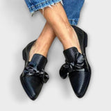 Zínnia – Loafer com padrão de pele de cobra e detalhe de laço